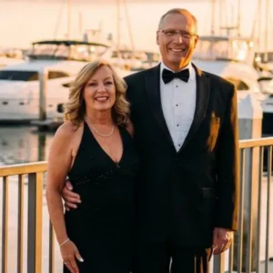 Cindy and her husband sharing their Peak Launch longevity and executive health success story