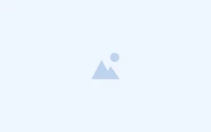 Soft blue background with a small light-blue mountain shape and a circle near the base at the bottom center, decorative abstract graphic.