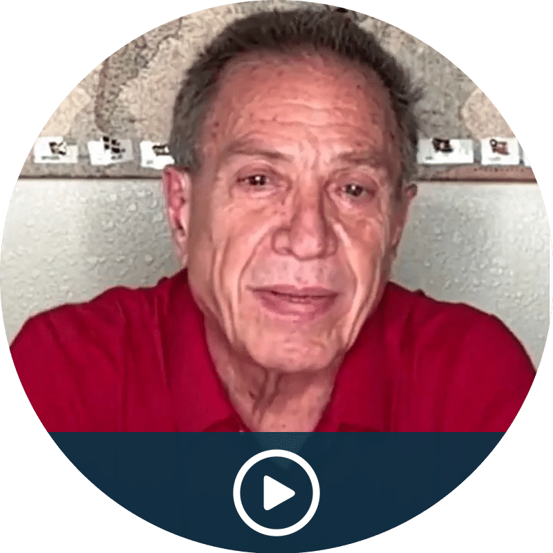 Video thumbnail: smiling man in a red shirt ready to play (video behind a circular frame)